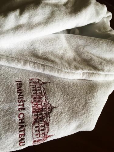 a white napkin with a red writing on it at Zámek Jemniště in Postupice