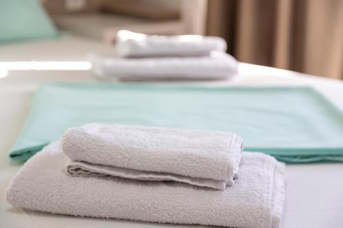Ένα ή περισσότερα κρεβάτια σε δωμάτιο στο Apartments Bella Notte
