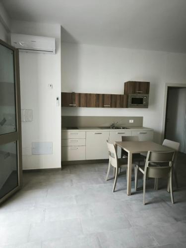 Η κουζίνα ή μικρή κουζίνα στο Acquaria Case Vacanze