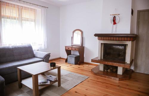 Ruang duduk di Dom nad rzeką Woziwoda