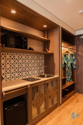 Kuchyň nebo kuchyňský kout v ubytování Apec Mandala Cham Bay Mui Ne - Ruby Apartment