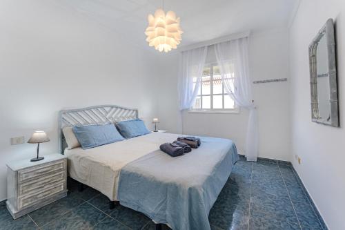 Ένα ή περισσότερα κρεβάτια σε δωμάτιο στο ValMar Apartamento Vista Océano , parking