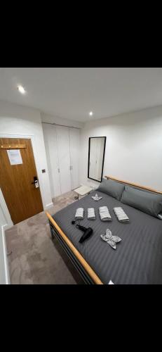 a bedroom with a large bed in a room at Room in Central London Zone 1 in London