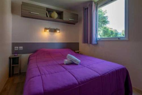 Postel nebo postele na pokoji v ubytování Camping - Parc aquatique - eeiccd