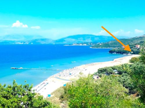 a view of a beach with an orange object at Apraos Beachfront House by DadoVillas in Apraos