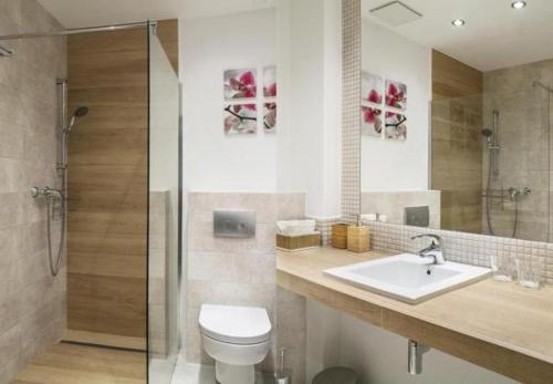 Kúpeľňa v ubytovaní Triton Apartments
