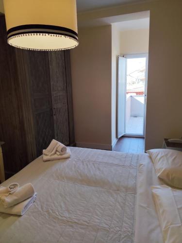 Postel nebo postele na pokoji v ubytování Hotel OC2