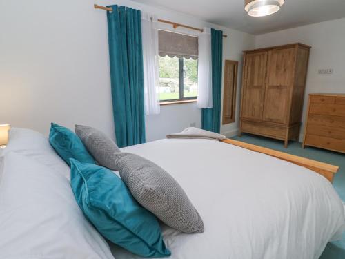 Postel nebo postele na pokoji v ubytování Chy Benyngoth