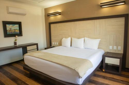 Katil atau katil-katil dalam bilik di Hotel Paseo de la Presa