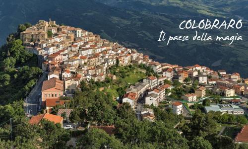 a small town on a hill with houses at Dimora Valicenti in San Giorgio Lucano