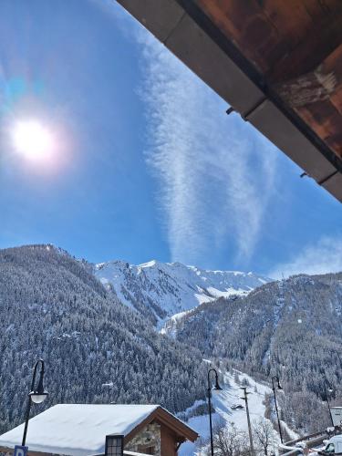 a view of a snow covered mountain from a ski slope at La Vieille Cloche in Saint-Rhémy-en-bosses