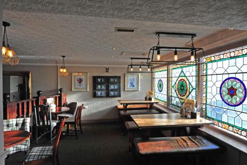 Et opholdsområde på The White Hart Inn by Greene King Inns