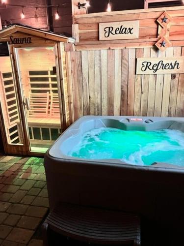 a hot tub with blue water in a store at Reno Romantic Couples Retreat in Reno