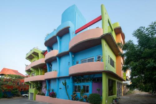 a colorful building with many colors on it at Casa Mirador 360 in Puerto Escondido