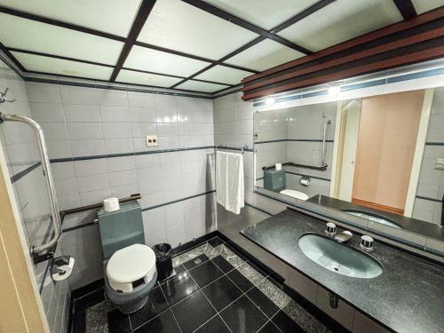Koupelna v ubytování Hotel Nikko