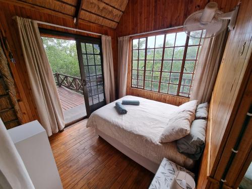 Postel nebo postele na pokoji v ubytování Ratel Retreat