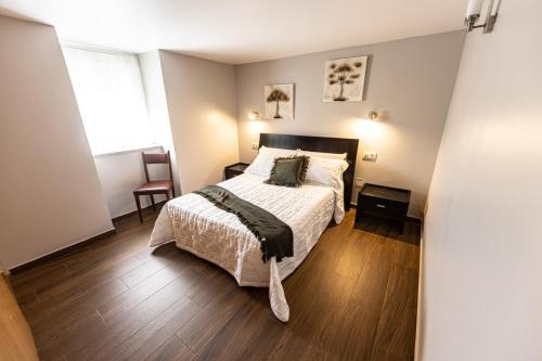 Postel nebo postele na pokoji v ubytování Casa Barreiro Piedra