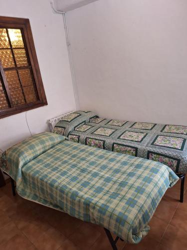 Ένα ή περισσότερα κρεβάτια σε δωμάτιο στο Alloggio turistico Casperia