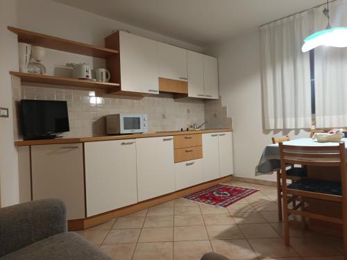 Kuchyň nebo kuchyňský kout v ubytování Hotel Residence Rosa