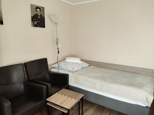 Ένα ή περισσότερα κρεβάτια σε δωμάτιο στο Apartamenty i pokoje u Kryni