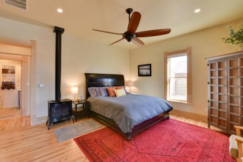 a bedroom with a bed and a ceiling fan at 0547 Downtown Salida Home, 1 Block to Main Street in Salida