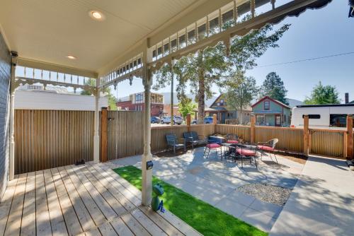 a patio with a table and chairs and a fence at 0547 Downtown Salida Home, 1 Block to Main Street in Salida