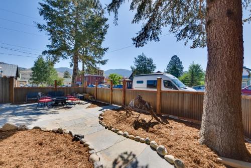a backyard with a tree and a fence at 0547 Downtown Salida Home, 1 Block to Main Street in Salida