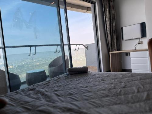 Cama o camas de una habitación en Supernova Spira Noida