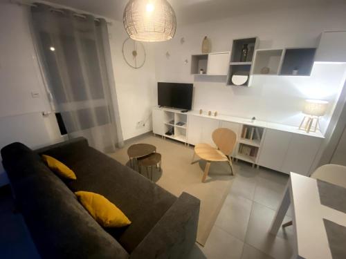 Petit nid au centre ville avec garage privé