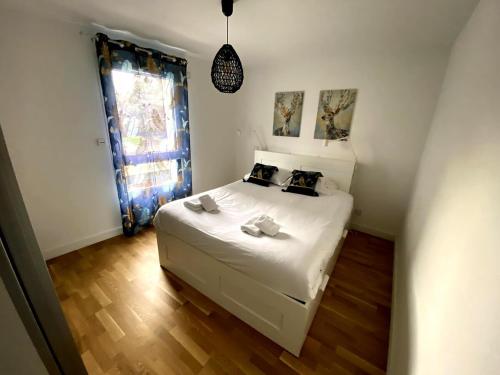 Petit nid au centre ville avec garage privé