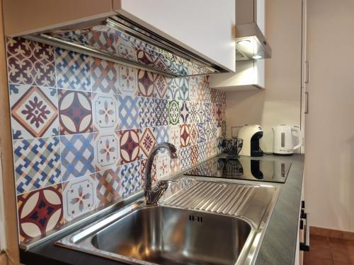 Η κουζίνα ή μικρή κουζίνα στο Sweet Loft in posizione favolosa