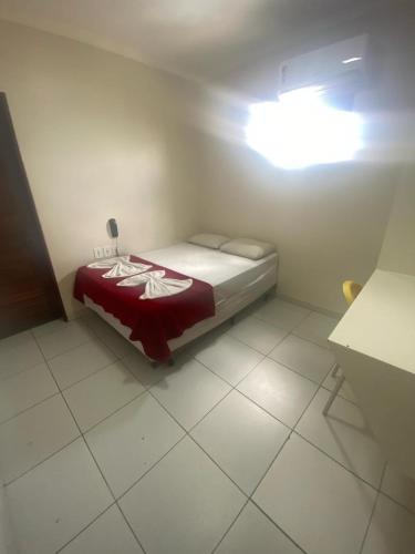 Ένα ή περισσότερα κρεβάτια σε δωμάτιο στο Hotel Prime Ceaka