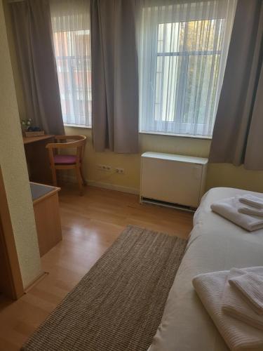 Postel nebo postele na pokoji v ubytování Ritters Weinstuben