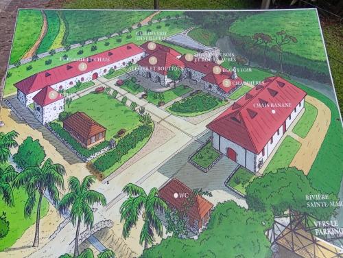 a drawing of a house with a map at Les Bromélias chez Djo et Rosy in Sainte-Marie