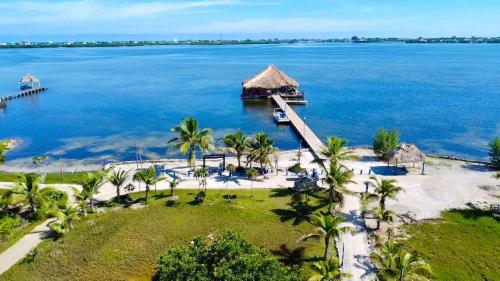 an aerial view of a resort on a island in the water at Brahma Blue Resort in San Pedro