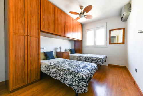 Postel nebo postele na pokoji v ubytování Gran casa Ámbar Málaga