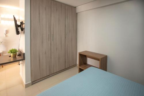 Ένα ή περισσότερα κρεβάτια σε δωμάτιο στο Flat inteiro Ônix Bueno