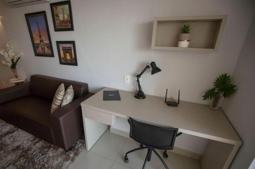 Χώρος καθιστικού στο Flat inteiro Ônix Bueno