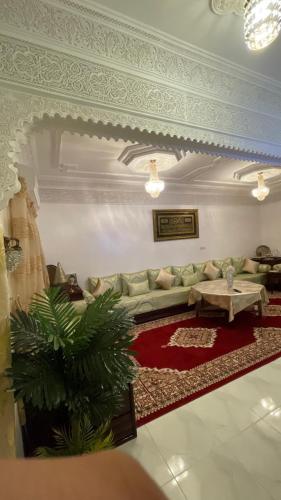 Una cama o camas en una habitación de Marrakech héberg