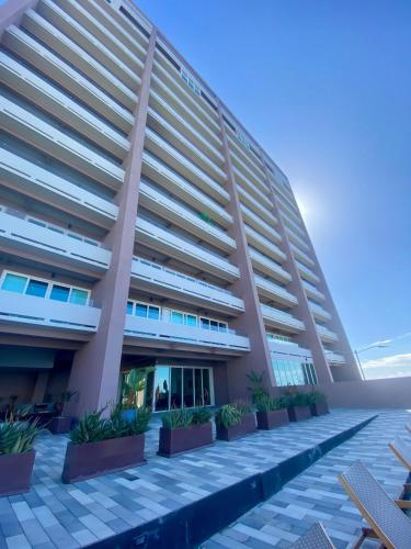 a rendering of the exterior of a building at Beach condo in Tijuana