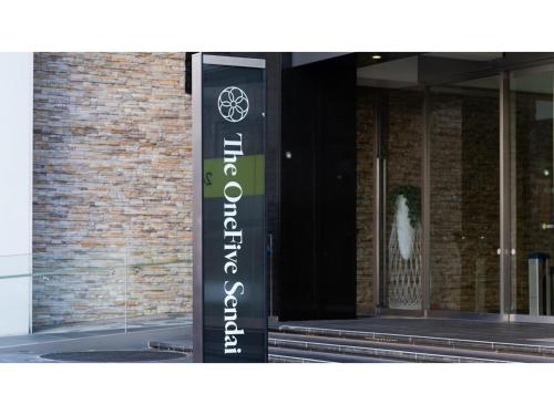 a sign on the side of a building at The OneFive Sendai - Vacation STAY 45056v in Sendai