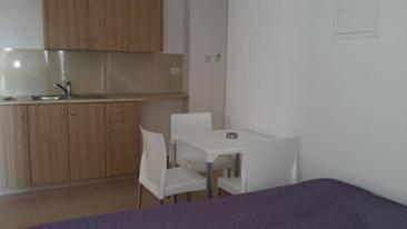 Kuchyň nebo kuchyňský kout v ubytování Simos Magic Hotel Apts