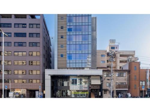 a group of tall buildings in a city at The OneFive Sendai - Vacation STAY 45028v in Sendai
