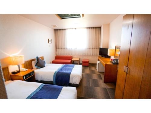 Giường trong phòng chung tại Hotel Area One Ise Inter - Vacation STAY 38356v