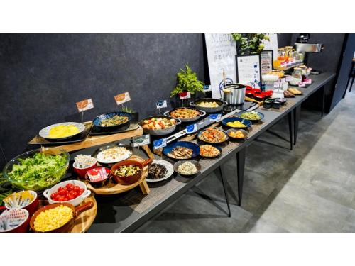 a buffet line with many different types of food at Hotel Area One Ise Inter - Vacation STAY 38519v in Ise