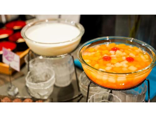 a bowl of fruit and a bowl of liquid at Hotel Area One Ise Inter - Vacation STAY 38525v in Ise