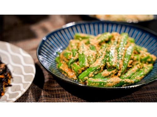 a bowl of food with green beans on a table at Hotel Area One Ise Inter - Vacation STAY 38525v in Ise