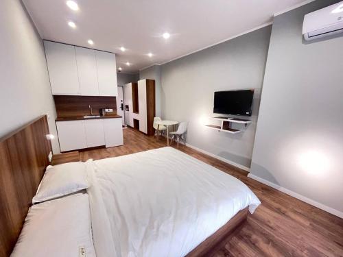 TV a/nebo společenská místnost v ubytování Paradise Apartments Solis Residence