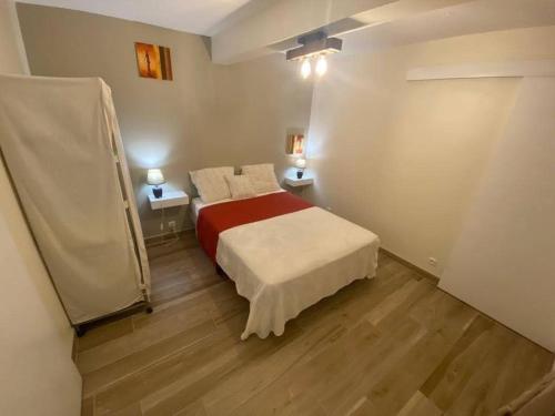 Postel nebo postele na pokoji v ubytování T 2 Ste Anne à 5mn de la Plage
