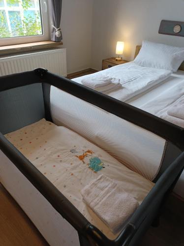 Una cama o camas en una habitación de Mooi Hotel Garni